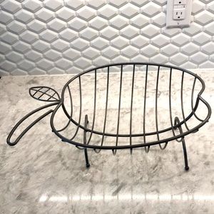 Metal countertop fruit holder.